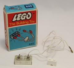 <h1>Lighting Device Pack (The Building Toy)</h1><div class='tags floatleft'><a href='/sets/445-2/Lighting-Device-Pack-(The-Building-Toy)'>445-2</a> <a href='/sets/theme-System'>System</a> <a class='subtheme' href='/sets/subtheme-Supplemental'>Supplemental</a> <a class='year' href='/sets/theme-System/year-1966'>1966</a> </div><div class='floatright'>©1966 LEGO Group</div>